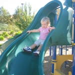 Keaton does the slide all by herself, like a big girl